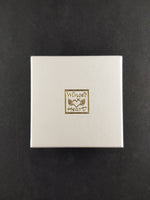 University of Glasgow paperweight box - outer view showing Winged Heart logo