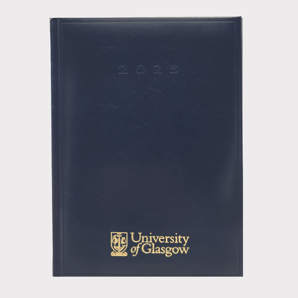 University of Glasgow Diary A5 Week to View. Navy faux leather, uni logo embossed in gold on centre bottom, 2026 embossed in navy top centre. 