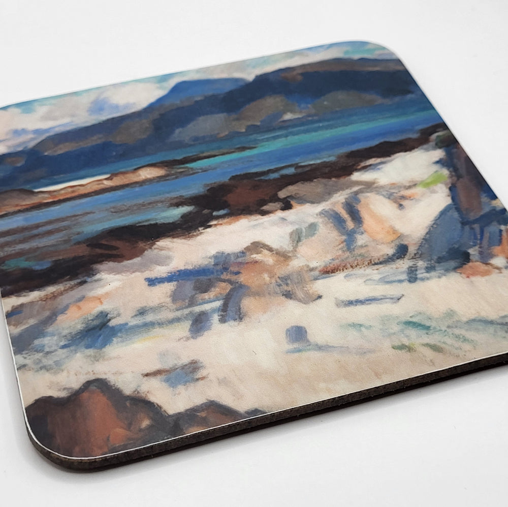 Coaster with a scenic design of a beach and mountains on a white background