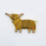 Hairy Coo Brooch - Front of brooch. Wool wrapped around  wooden highland cow body. 