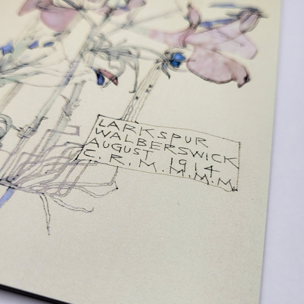 Greetings card featuring Charles Rennie Mackintosh's cuckoo flower watercolour. The image shows a close-up of the signature box at the bottom of the painting.
