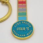 Lord Kelvin Absolute Hero Thermometer Keyring (detail). A full-colour enamel keyring in the shape of a thermometer with a gilt metal chain and key loop. The text at the base of the thermometer reads: "Lord Kelvin Absolute Hero" in uppercase letters, with the figure -273.15c in the middle.