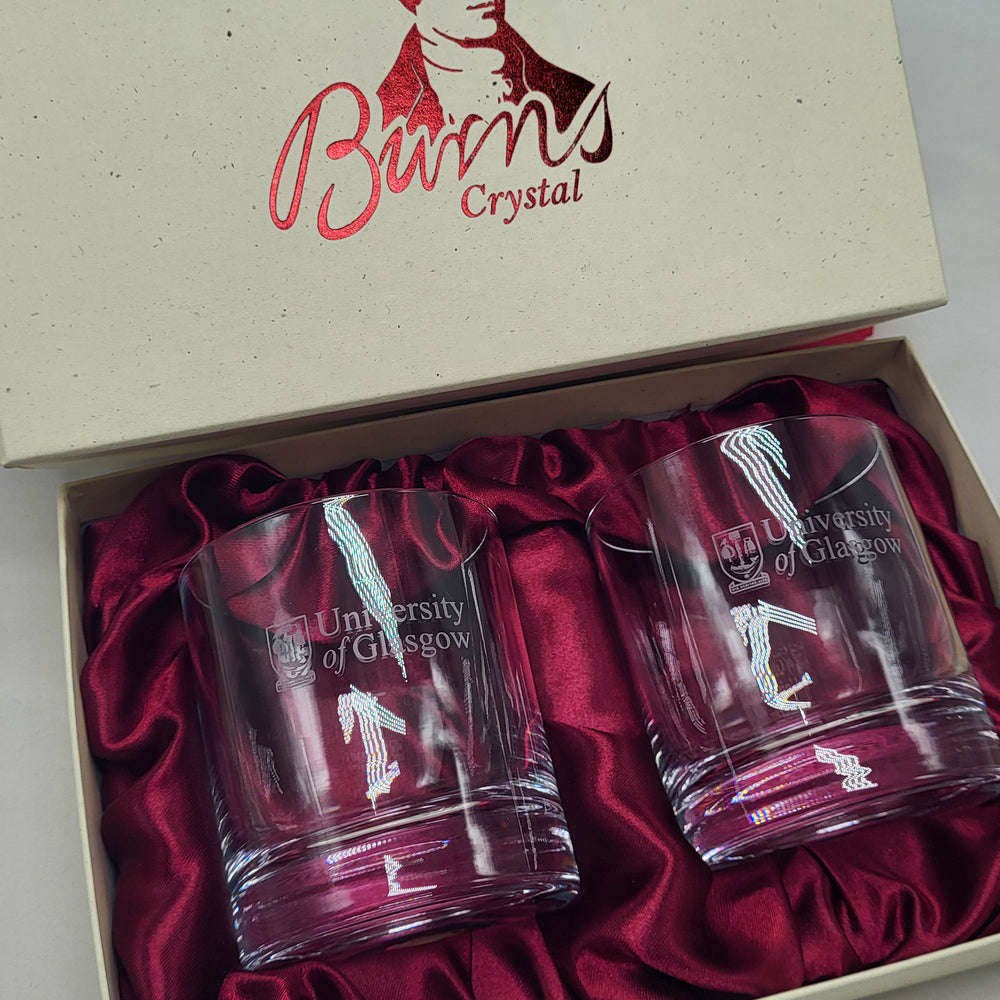 Two University of Glasgow tumblers in a box with 'Burns Crystal' branding.