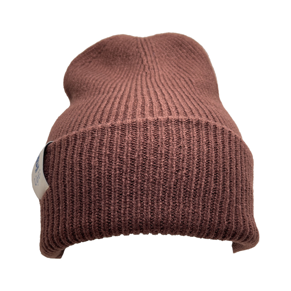 Brown knit beanie on a white background