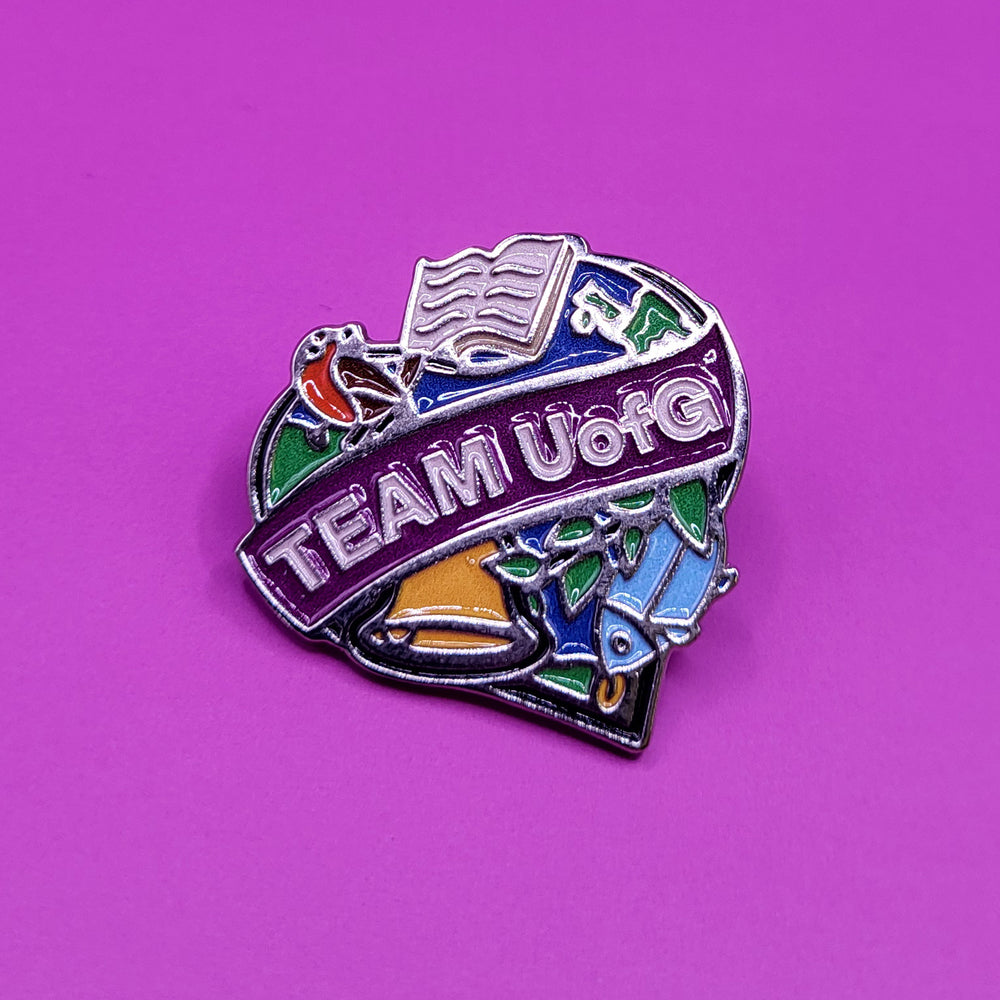 Colorful 'TEAM UofG' badge on a purple background