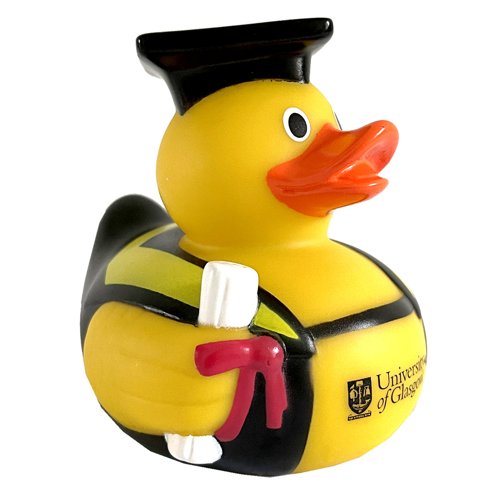 Graduation Duck with Scroll - Rubber Duck wearing a mortar board and gown, holding a degree scroll. The University of Glasgow crest is printed on its chest.
